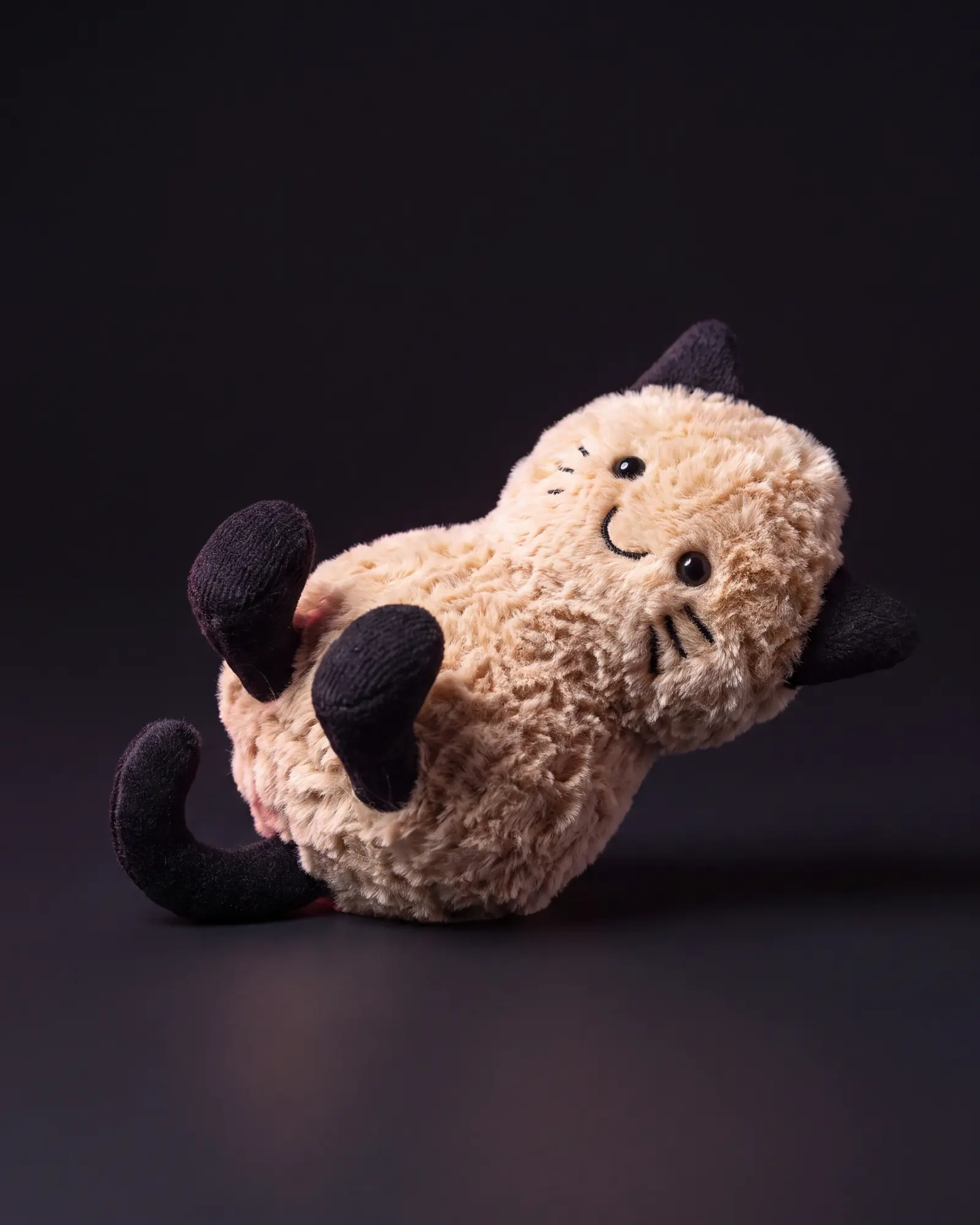 Amuseables Peanut ‘Cat’ on a dark studio background.