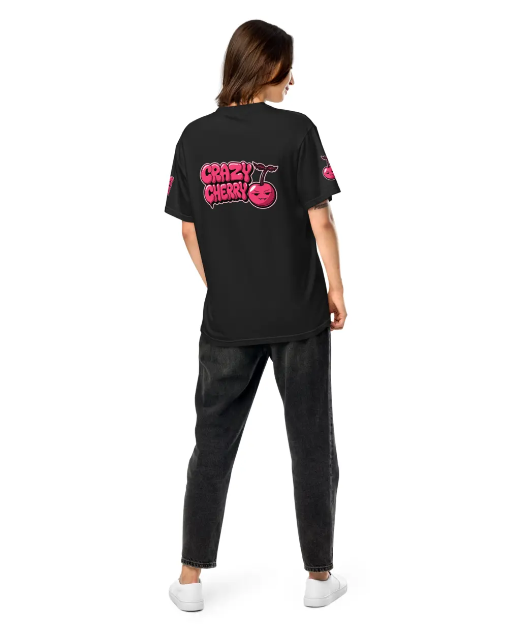Cherry Tee worn from behind - the full logo across the back, sleeve print showing.