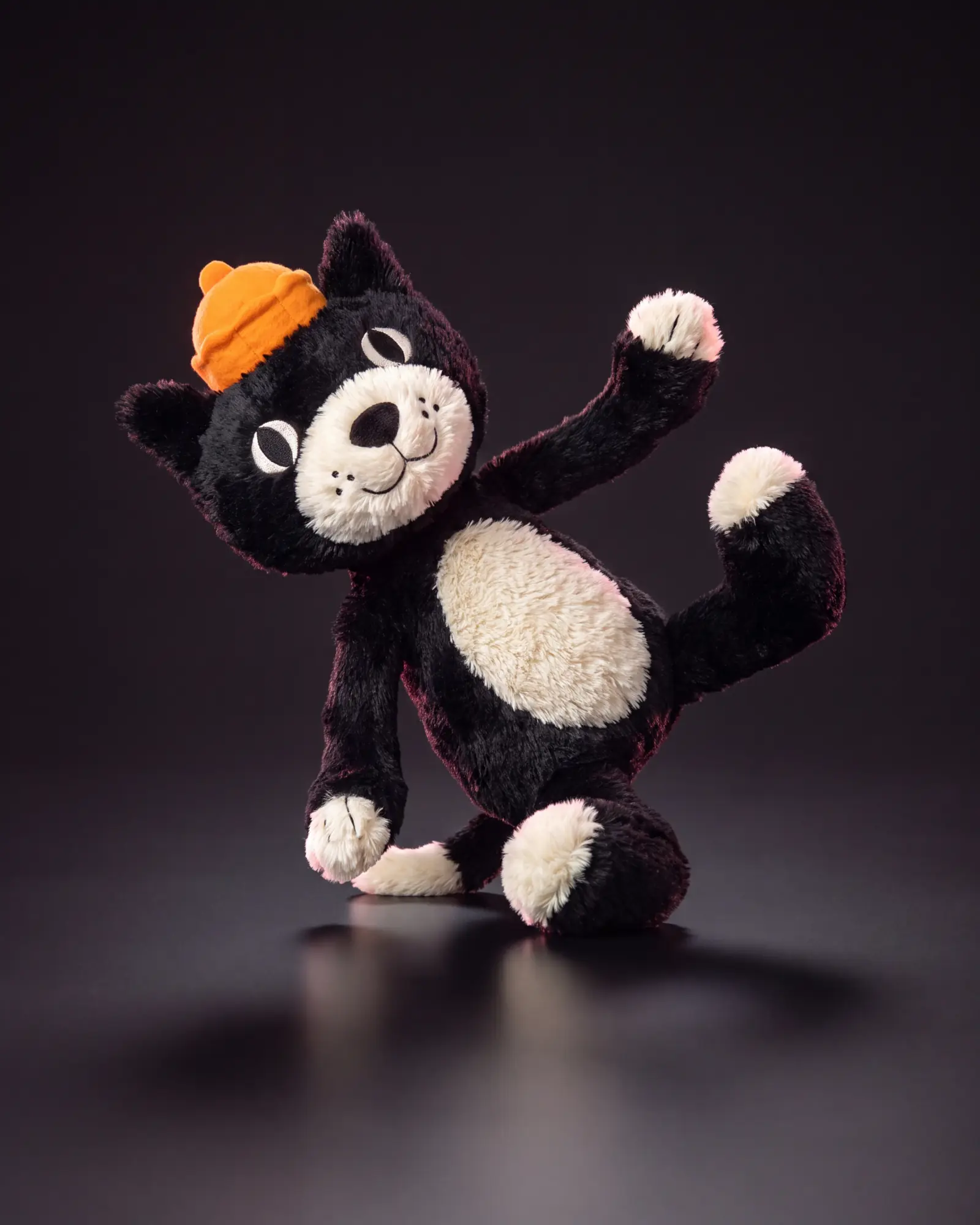 Jellycat Jack on a dark studio background.